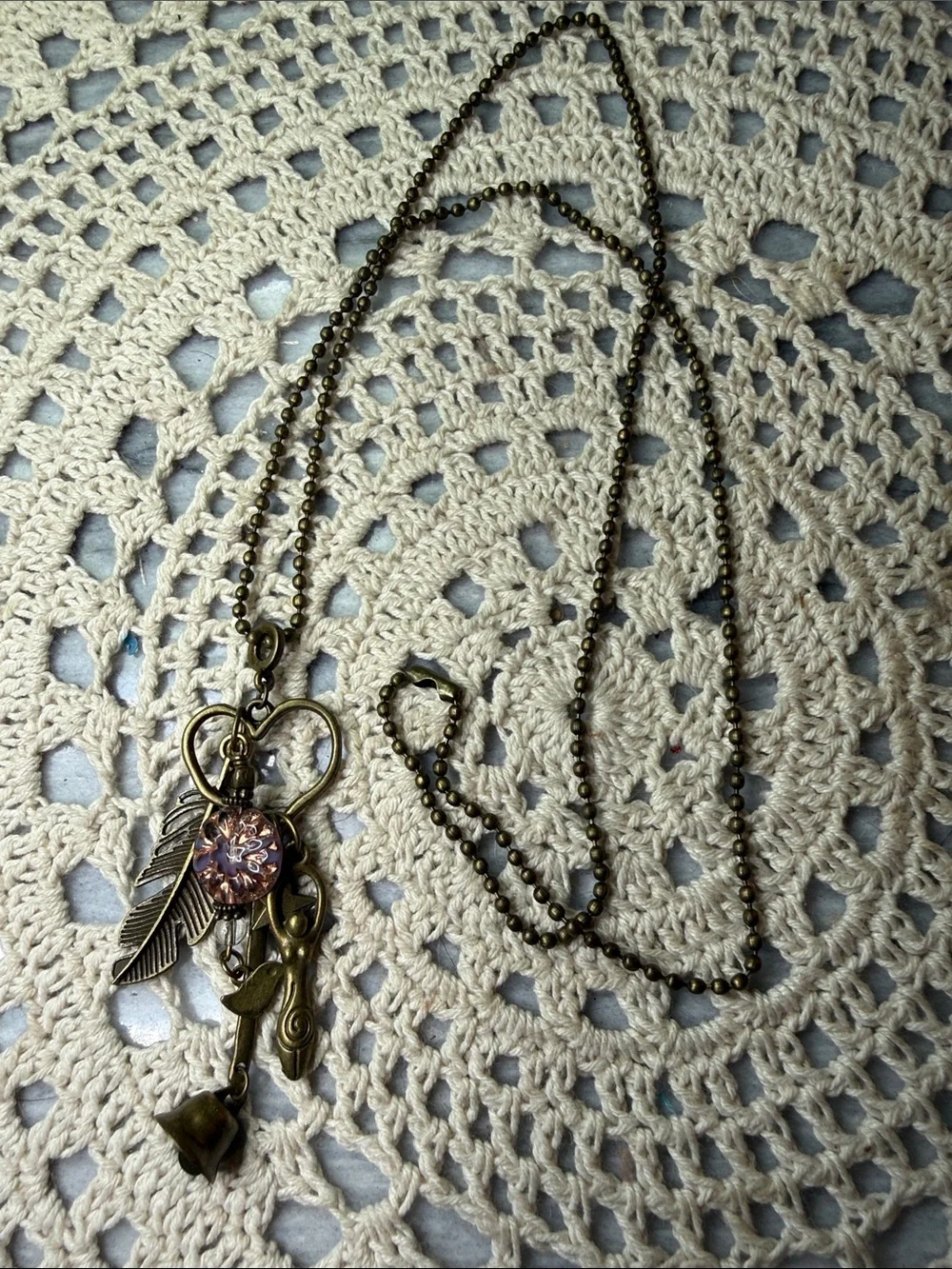 Vintage-Style Bronze Heart & Feather Pendant 26” Necklace with Pink Crystal